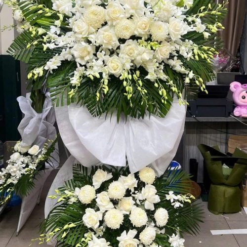 Kệ Hoa Viếng Chia Buồn Vĩnh Hằng Tone Tím Trắng